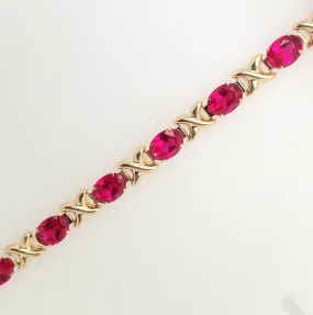 14KY Oval Lab-Grown Ruby Bracelet 7.25in