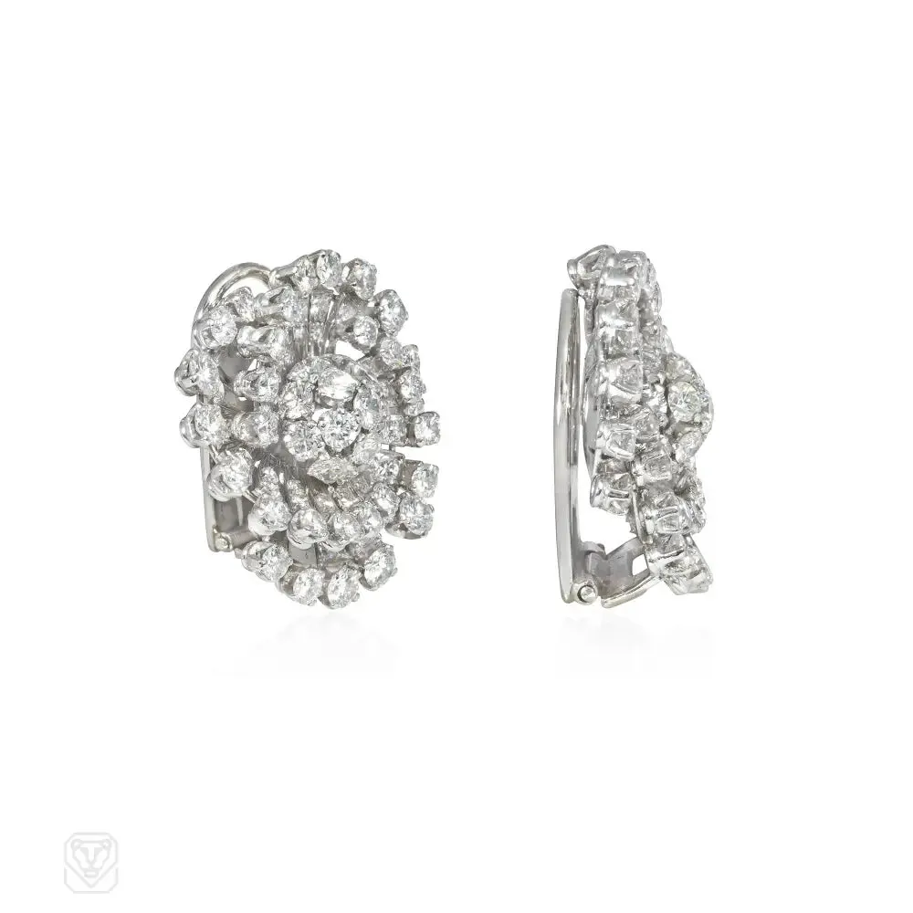 1950s diamond and platinum flower swirl earrings