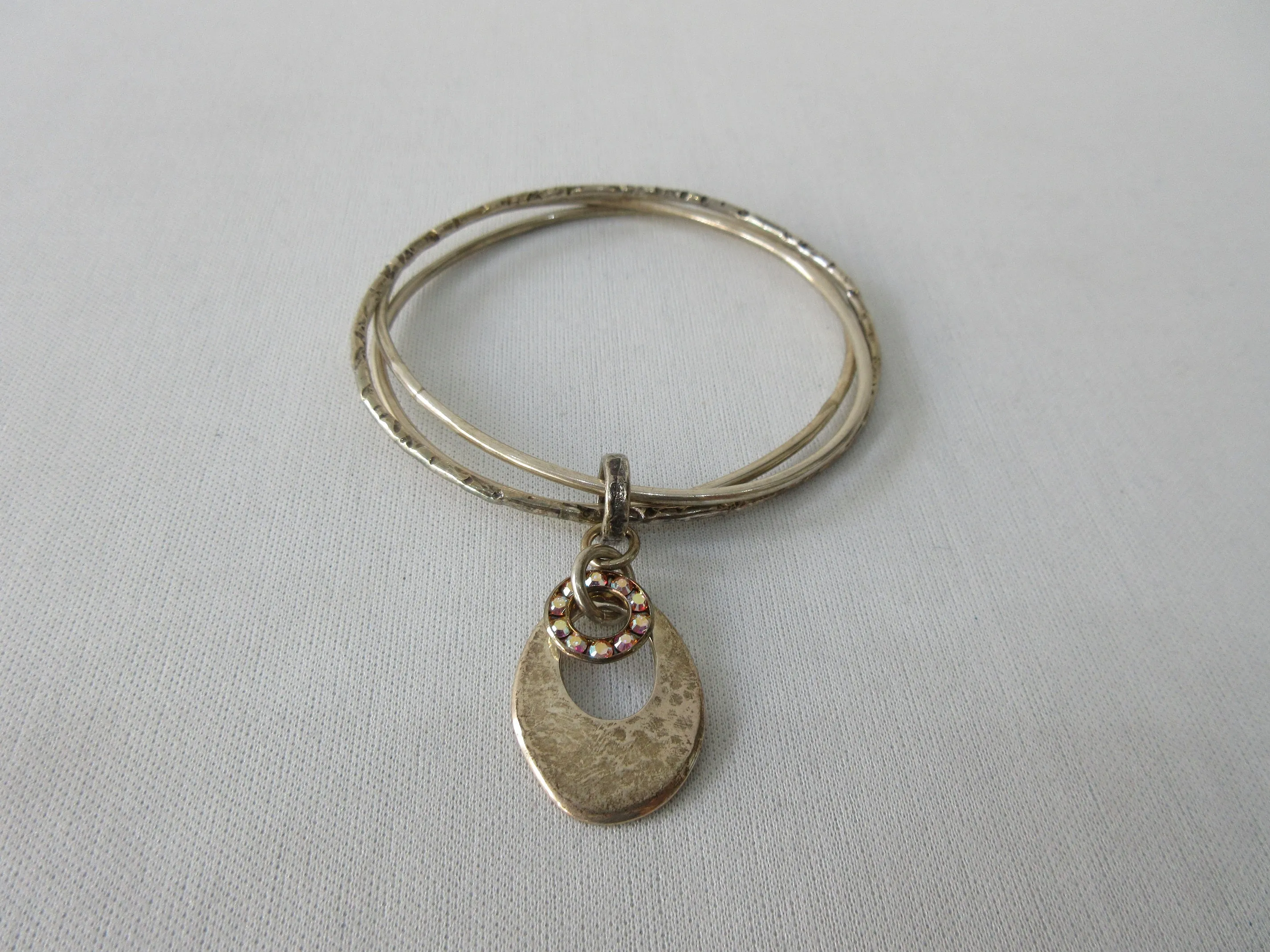 20A43 -Karyn Chopik Multi 3 Ring Bracelet with Hollow Teardrop and Crystal Ring