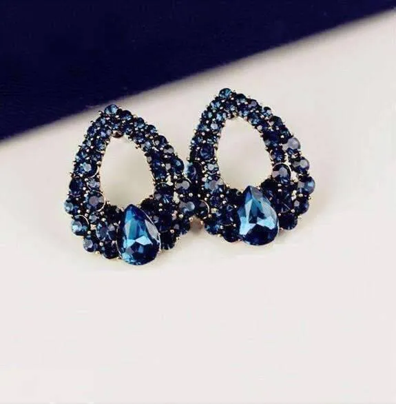 Alluring Sapphire Blue Austrian Gold Plated Cocktail Rhinestone Earrings For Woman