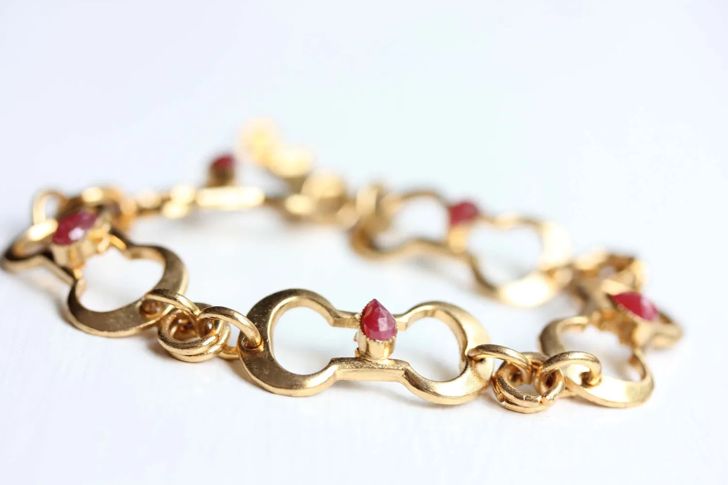 Gold Oval Link Ruby Bracelet