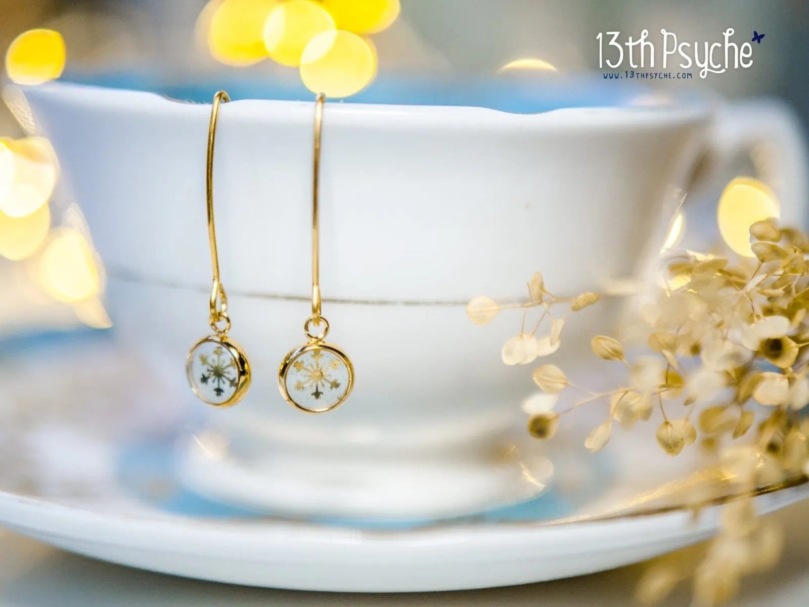 Gold snowflake stainless steel earrings