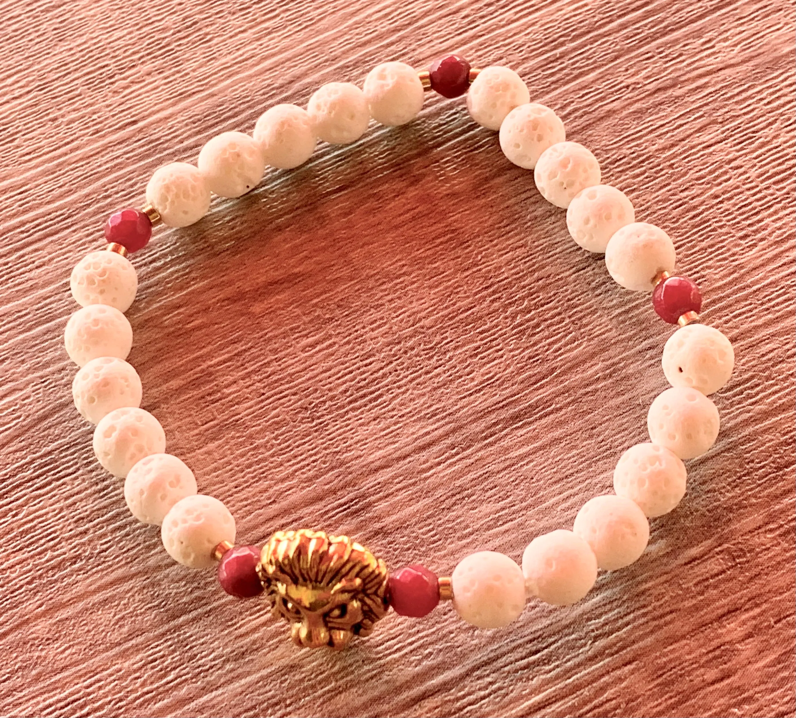 Leo Handmade Ruby, Gold Plated Hematite, and White Lava Or Black Wood Beaded Expandable Bracelet with Lion Charm