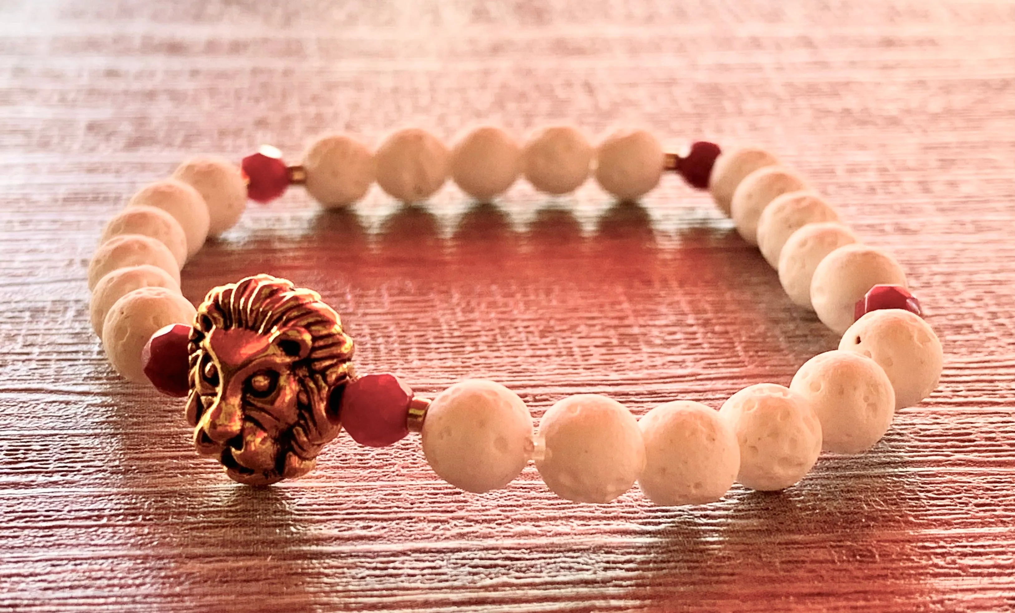 Leo Handmade Ruby, Gold Plated Hematite, and White Lava Or Black Wood Beaded Expandable Bracelet with Lion Charm