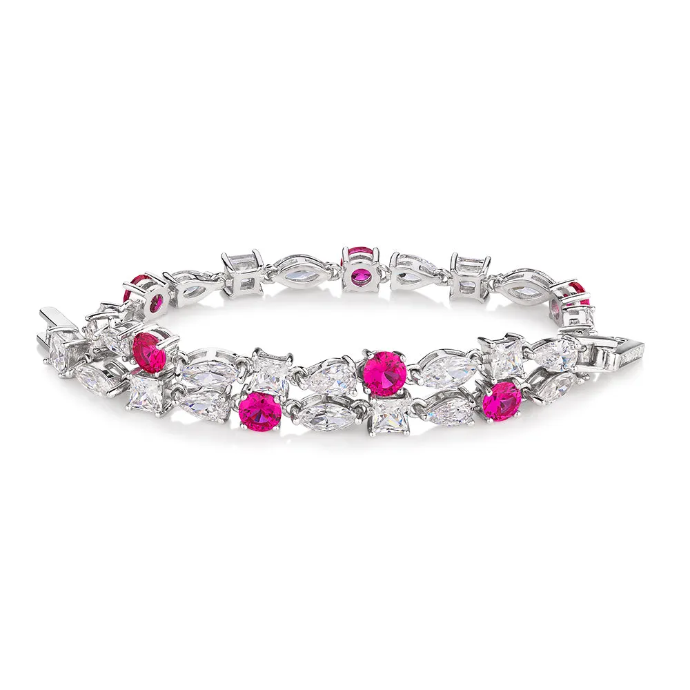 Pear, Marquise and Round Brilliant tennis bracelet with ruby simulants and 6.38 carats* in sterling silver