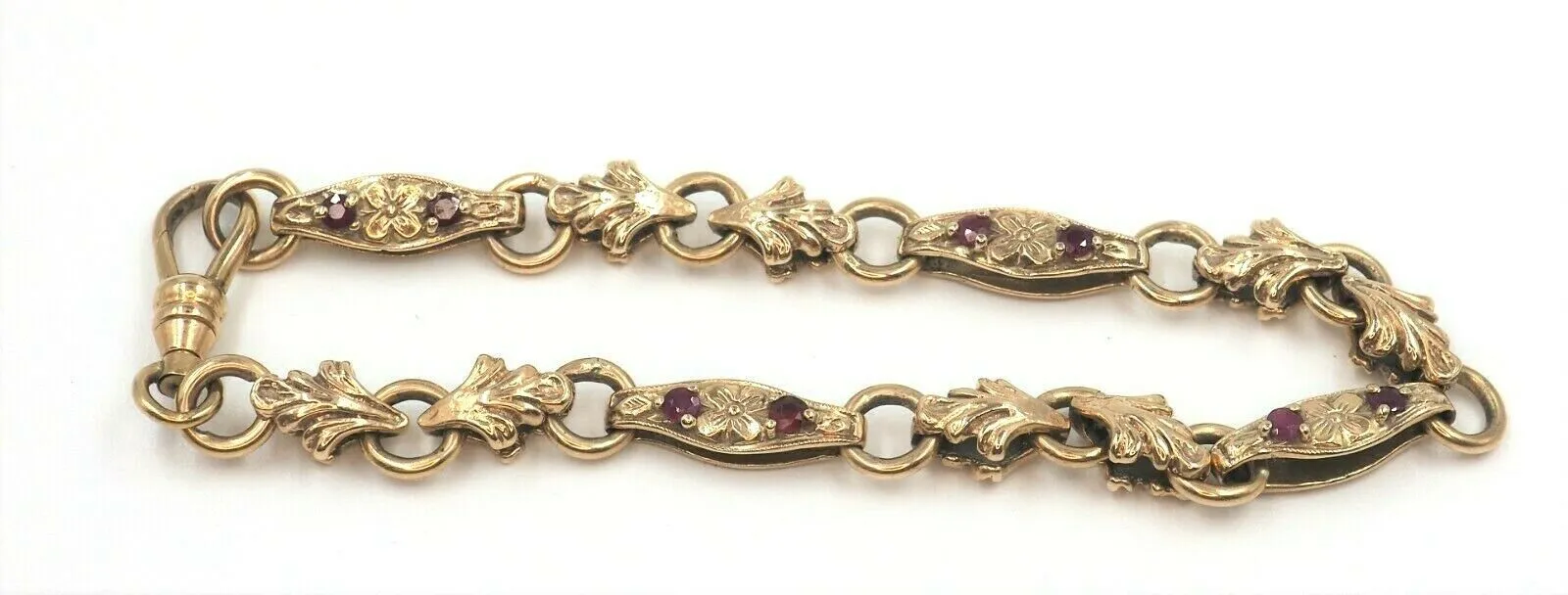 Ruby 9ct Yellow Gold Bracelet with Fleur de lis & Flower Patterned Links