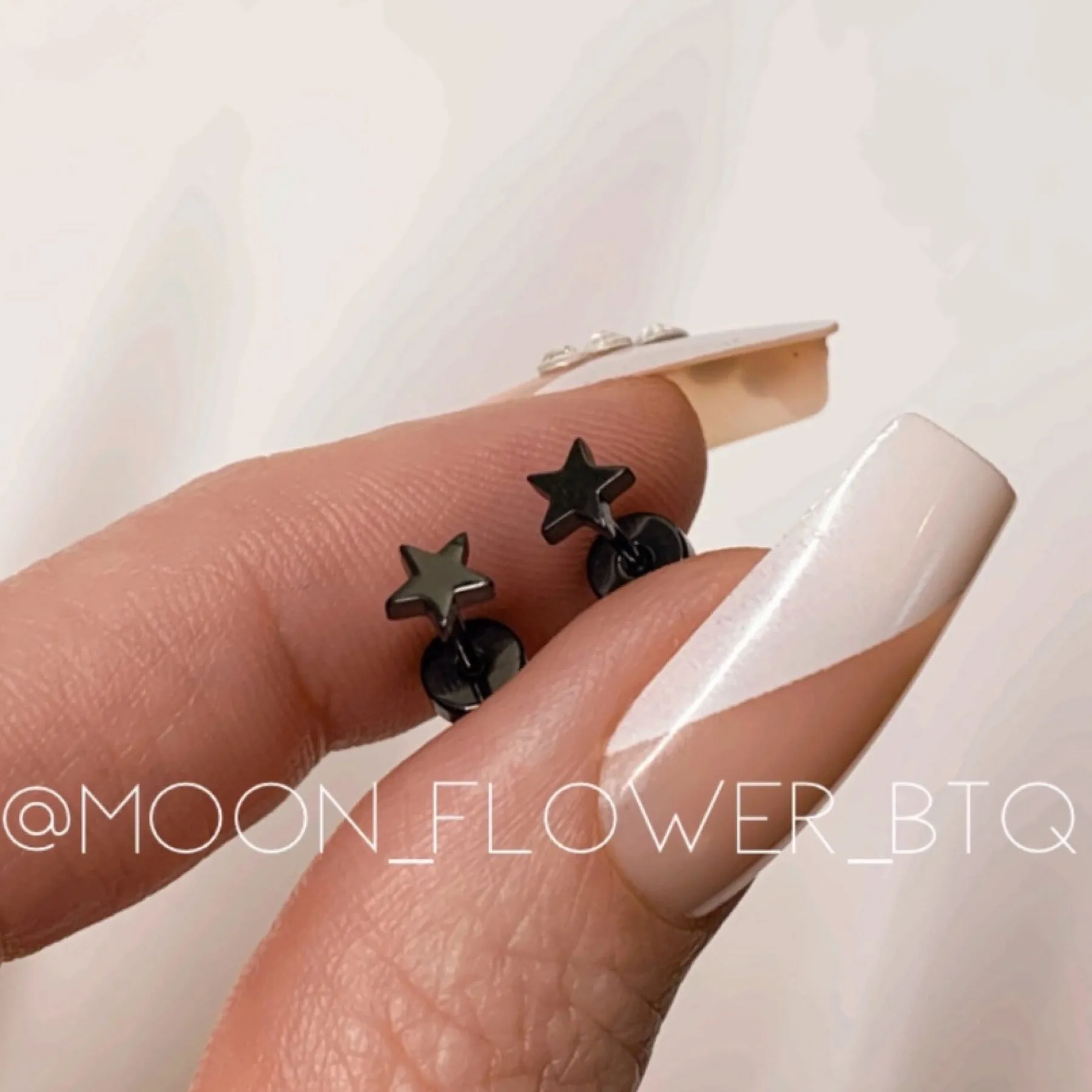 Tiny Black Star Earrings